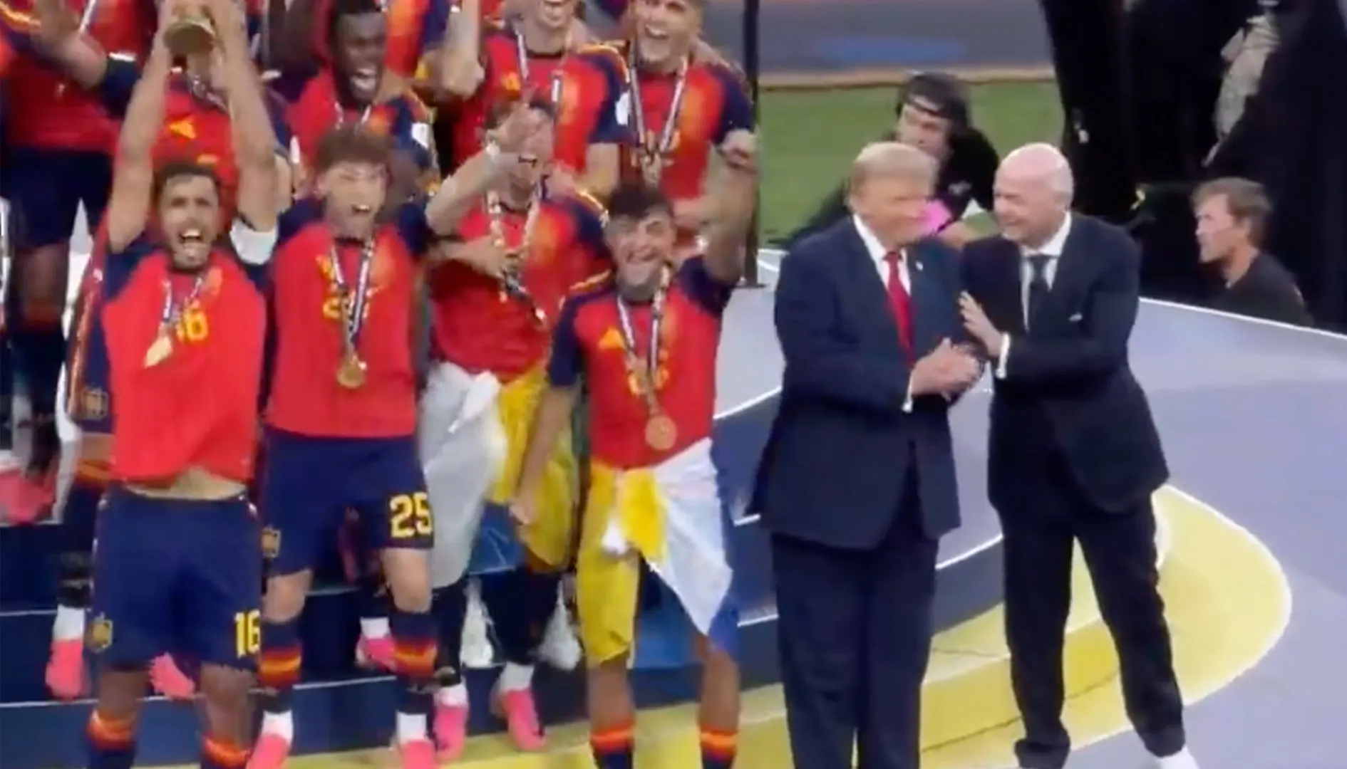Infantino Guides Trump Aside During Spain's World Cup Celebration