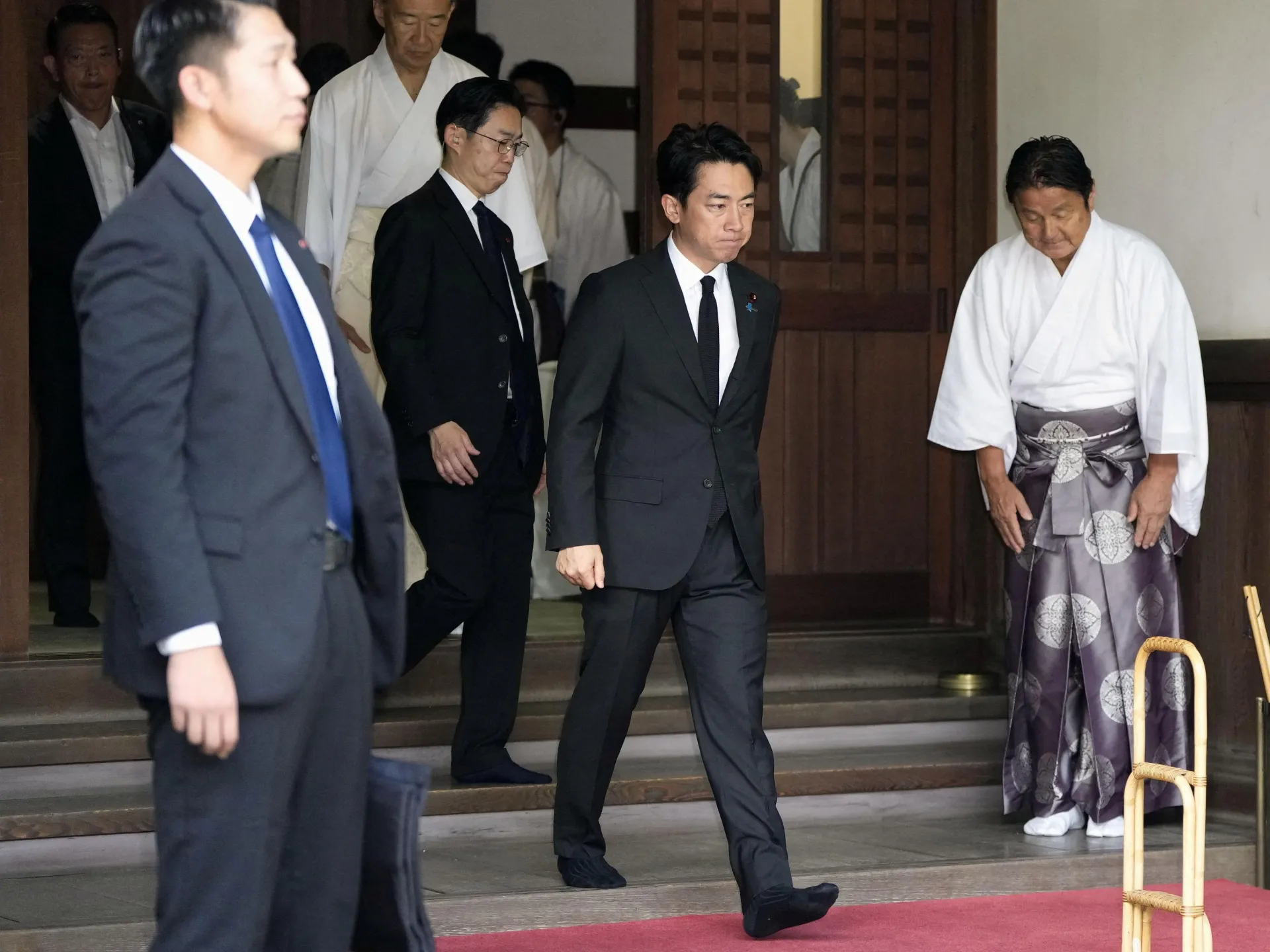 Japanese Defense Minister's Shrine Visit Ignites Regional Tensions