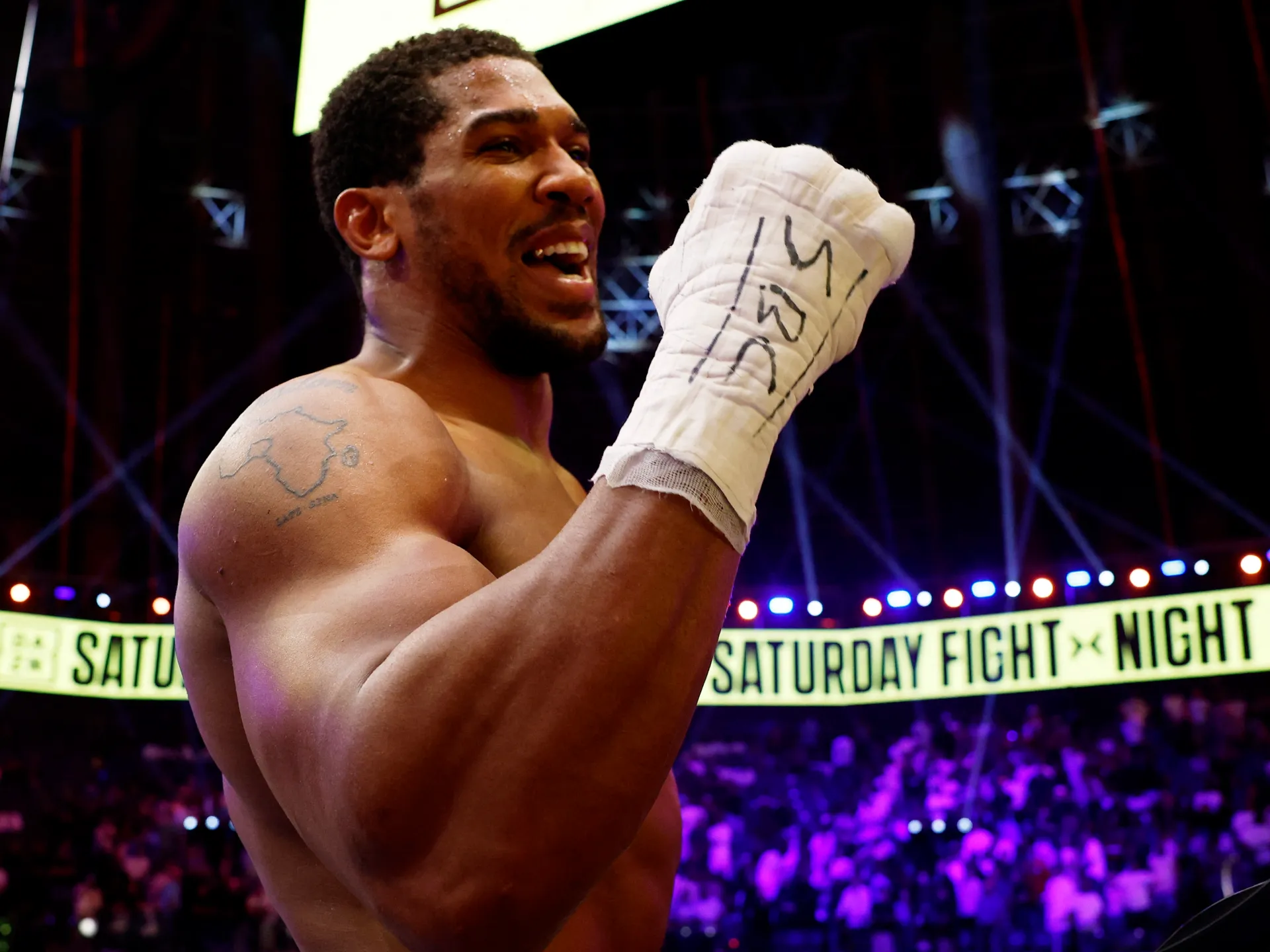 Joshua Overcomes Two Knockdowns to Secure Victory, Setting Stage for Fury Bout